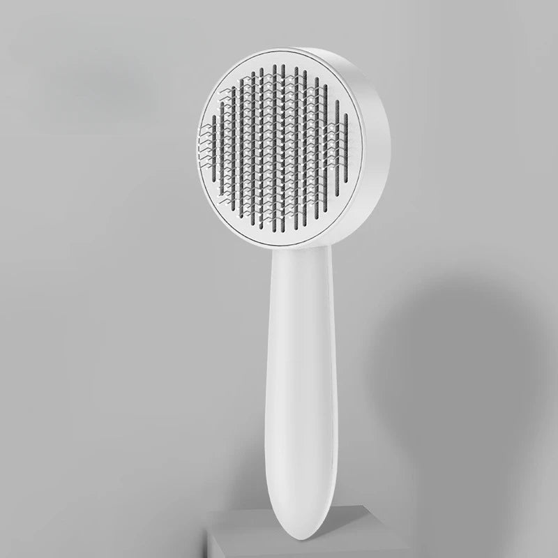 Brosse autonettoyante pour chats et chiens