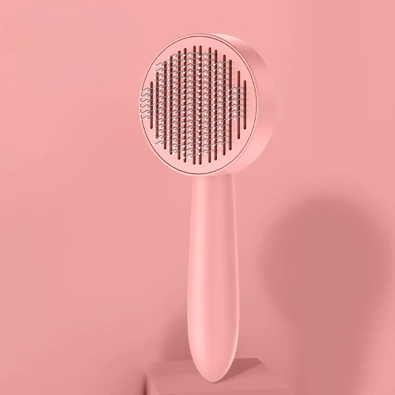 Brosse autonettoyante pour chats et chiens